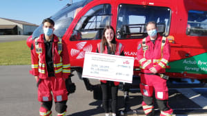 Elain donates £1,000 to Wales Air Ambulance