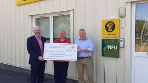NFU Mutual in Brecon donates over £6,000 to lifesaving charity in memory of friend