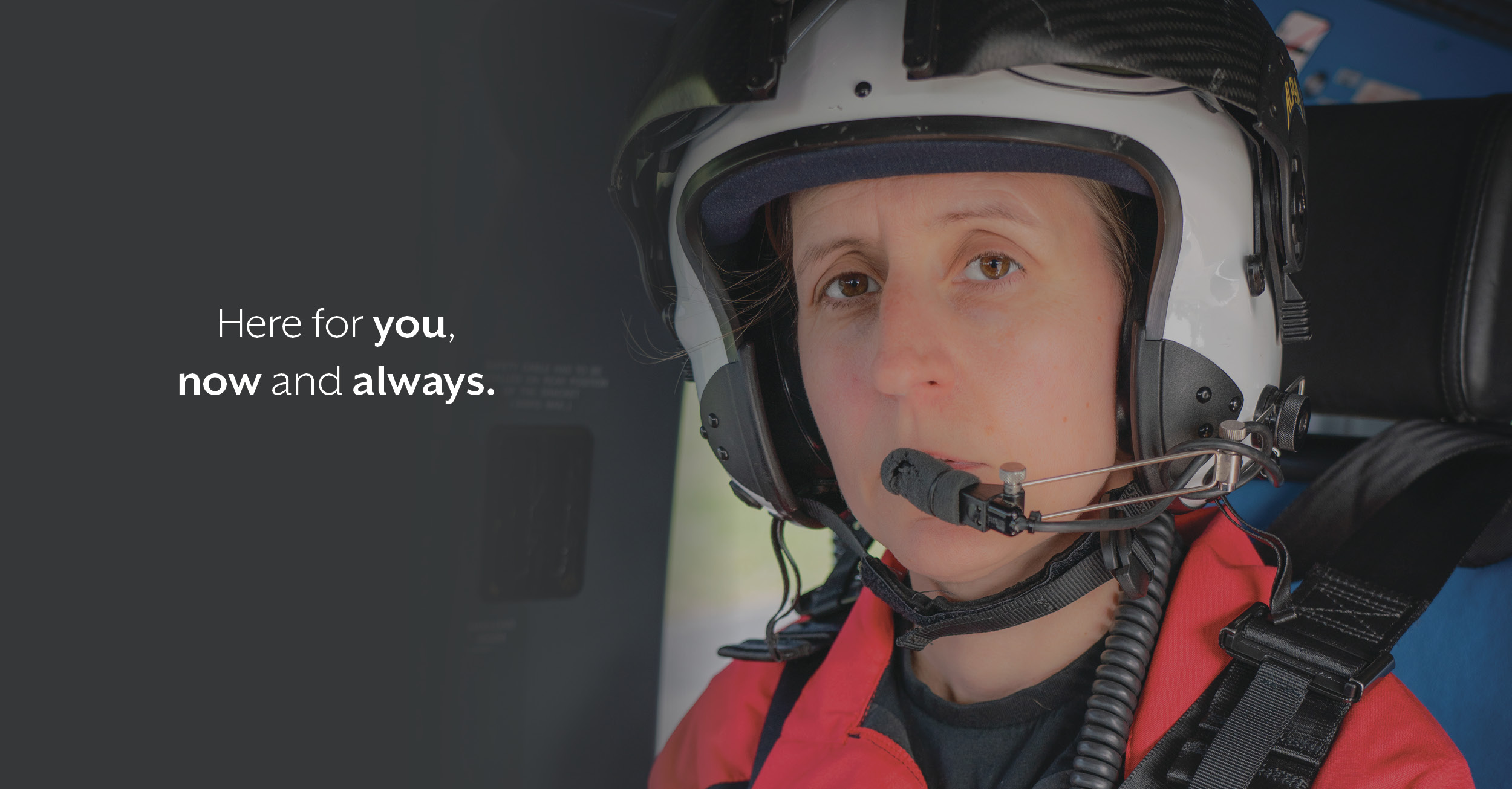 A close up photograph of a doctor, Ami, with writing that says here for you, now and always on it.