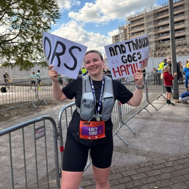 Lucy at the 10k after completing the event