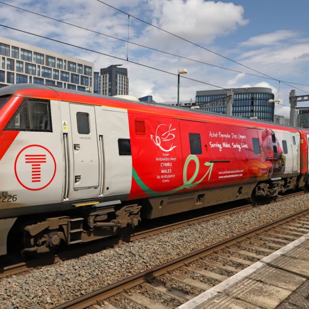 Image of a Transport for Wales train with Wales Air Ambulance branding.